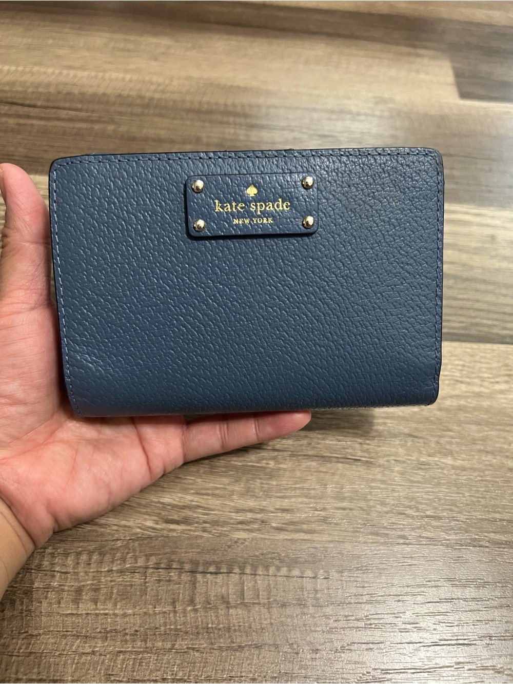 Kate Spade Navy Pebbled Leather Bifold Wallet with Gold Plaque